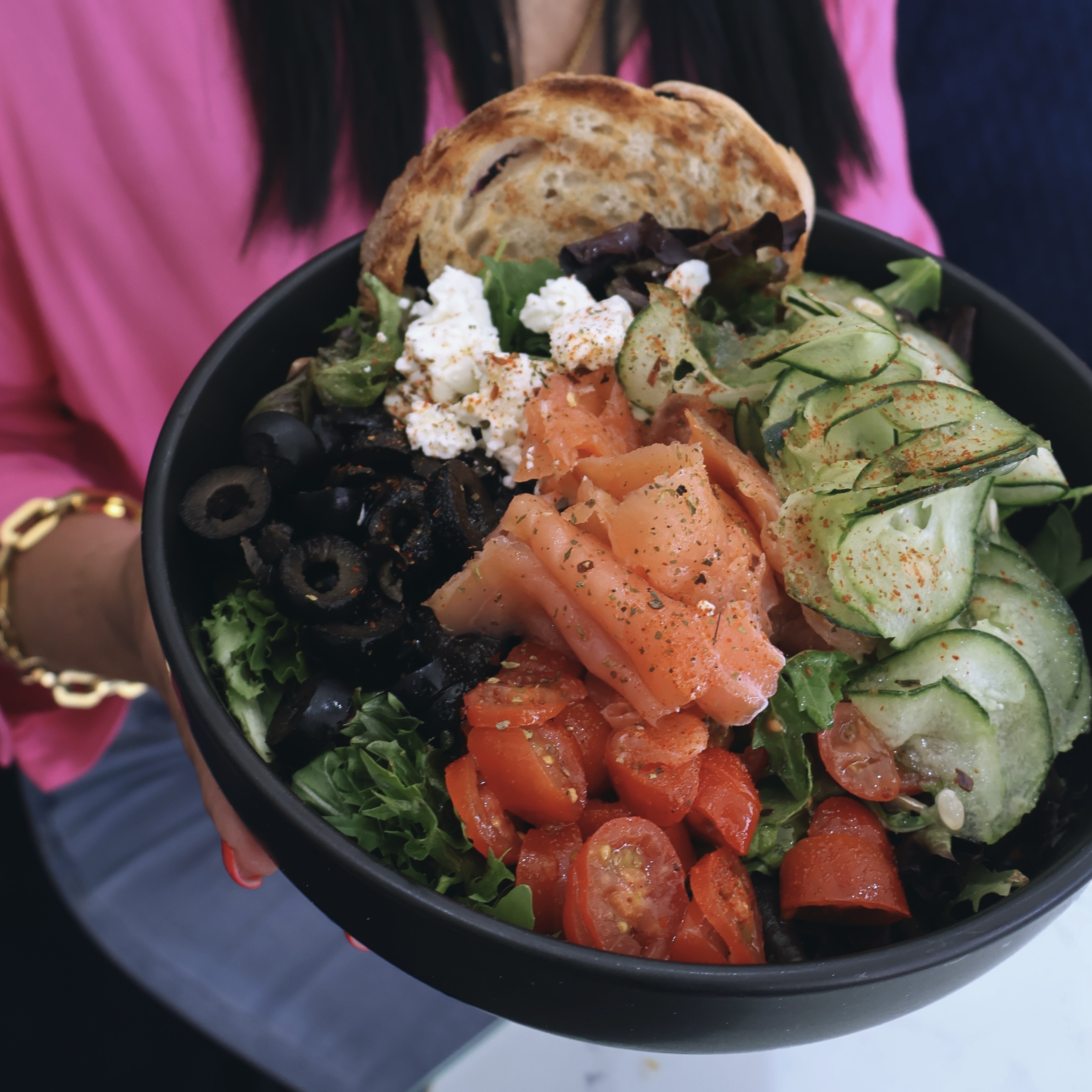 Salad, smoked salmon, feta cheese, cherry tomato, cucumber, olives, Mafra bread